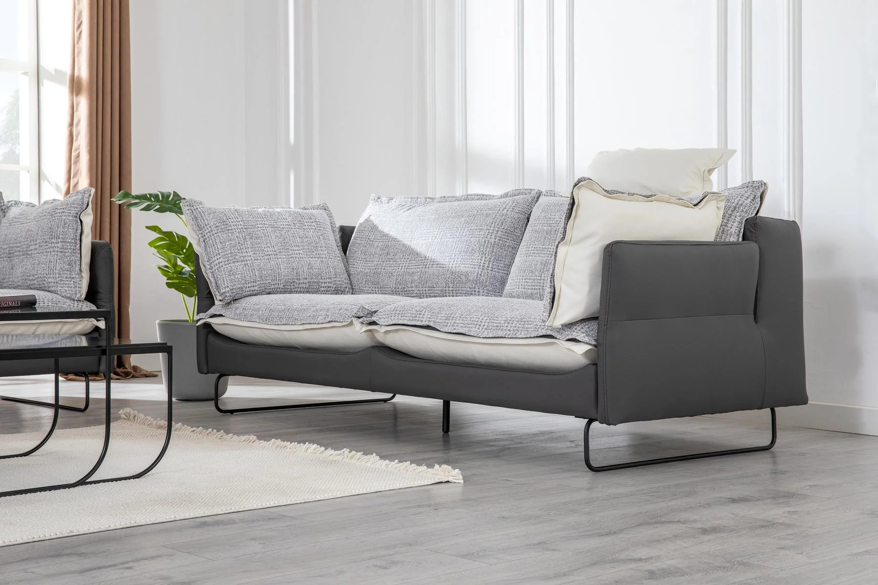AY IŞIĞI three-seat contemporary sofa viewed from an elegant side angle