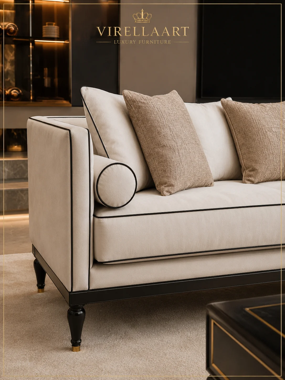 Close-up of the Bahar ivory sofa arm with black piping, cylindrical bolster and textured beige cushions