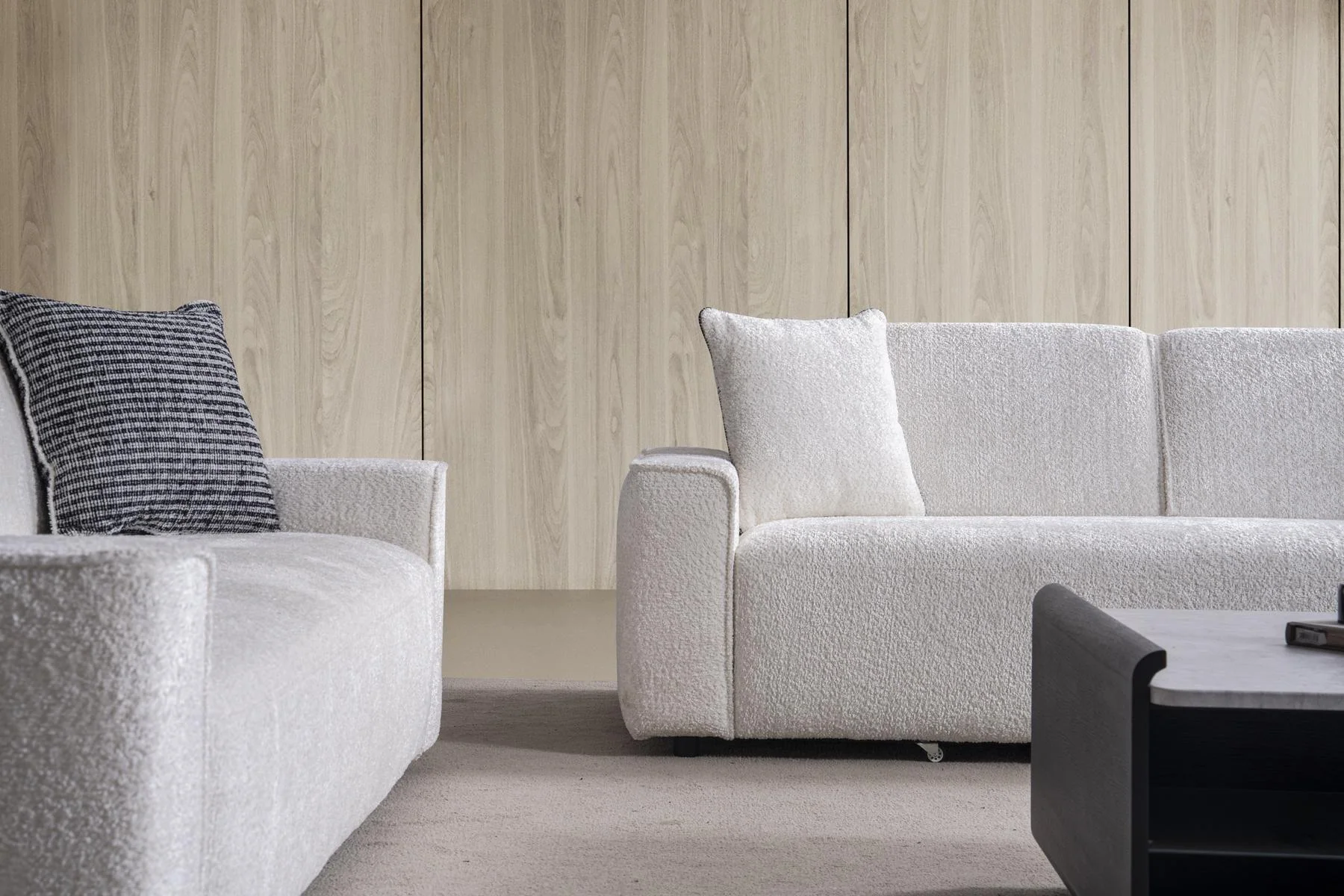BAHAR sofa side detail showing broad squared arm and structured seat cushions