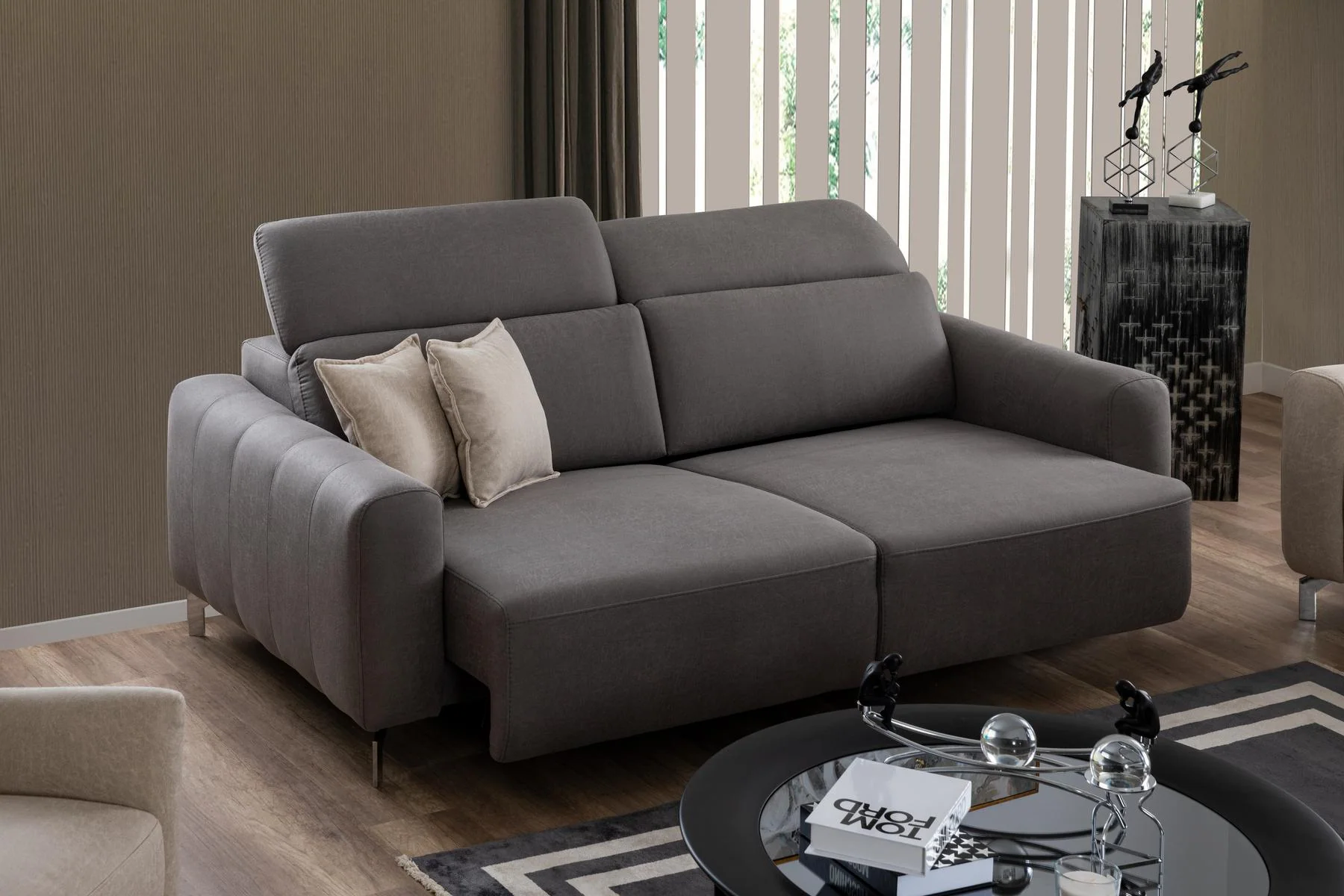 BURGAZ contemporary armchair with structured cushions and sculpted side profile