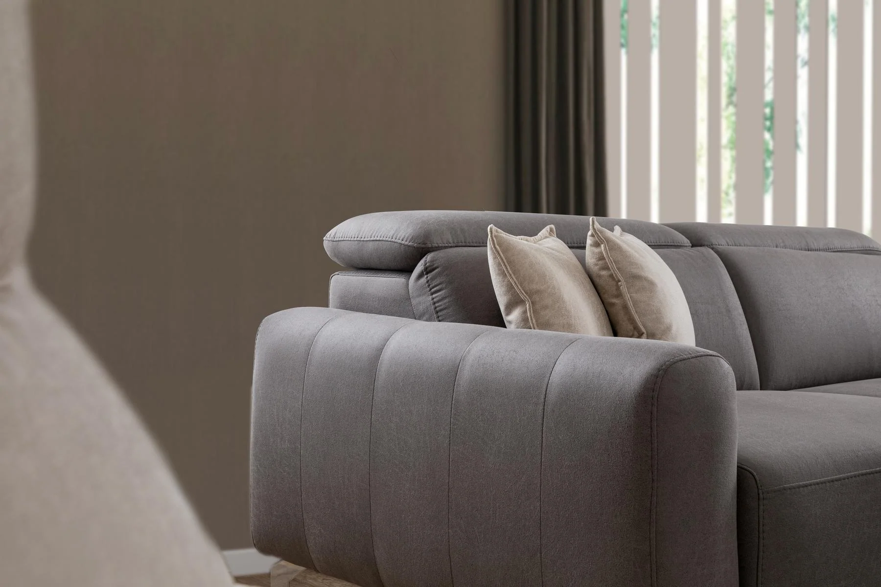 BURGAZ sofa rear and side detail showing the substantial upholstered back design