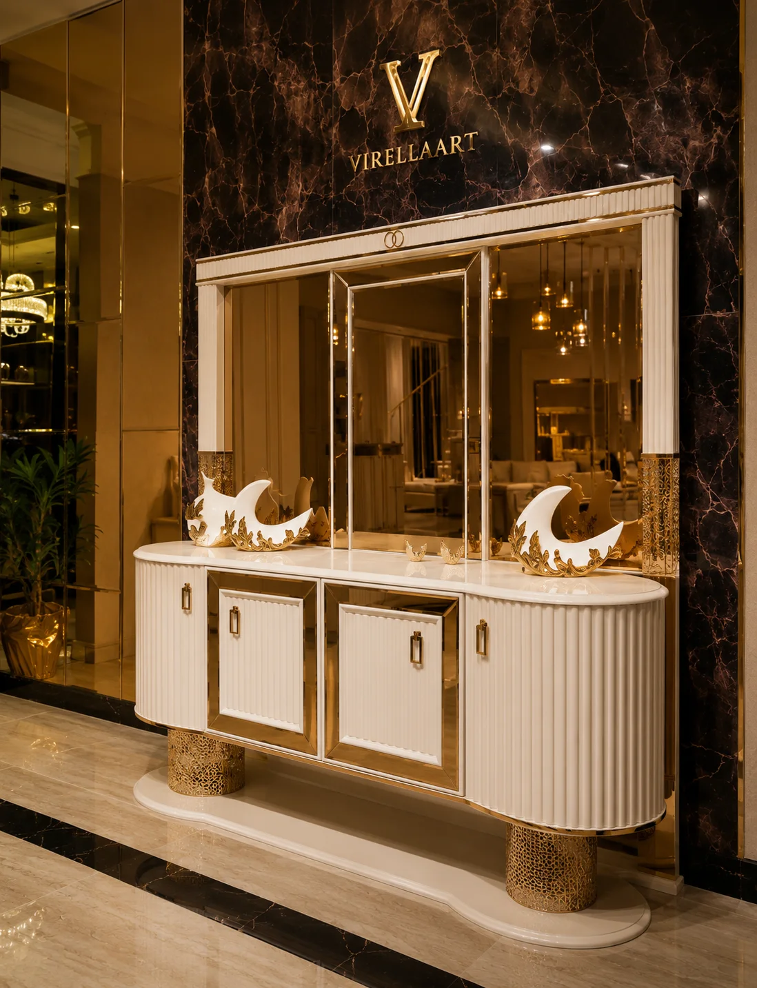 Deluxe ivory console with fluted curved doors, mirrored center panels, gold-tone cylindrical legs and a large framed mirror