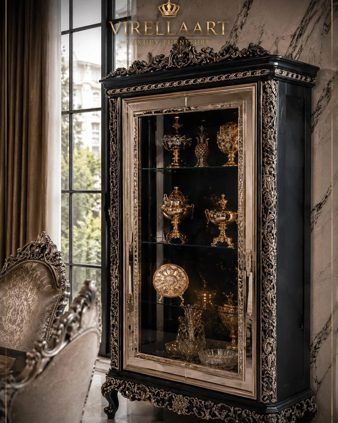 Zumrut glass display cabinet with glossy black framing, silver-tone carved ornament, glass shelves and decorative gold-tone objects