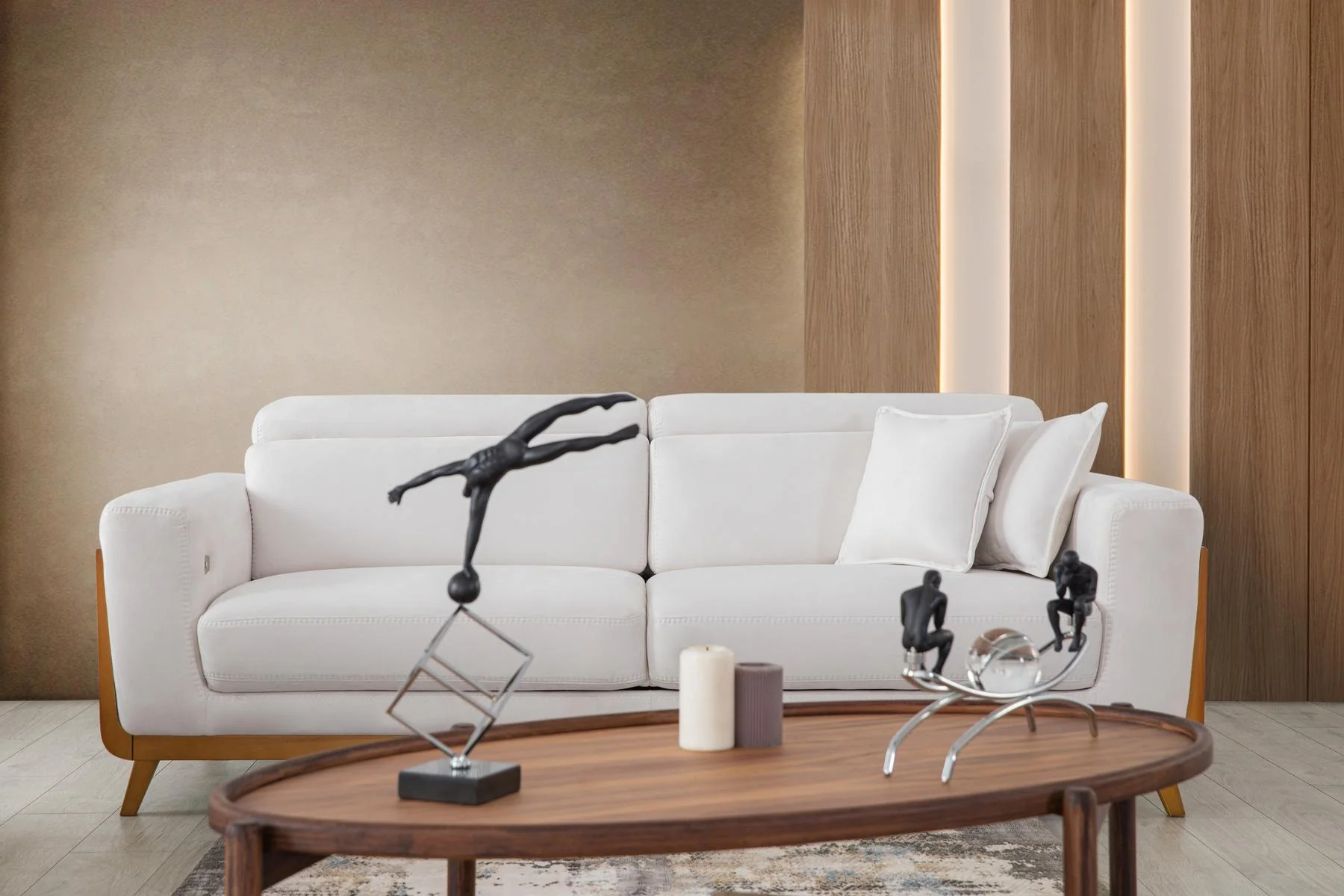 HÜNKAR contemporary three-seat sofa with clean cushions and wood-framed side profile