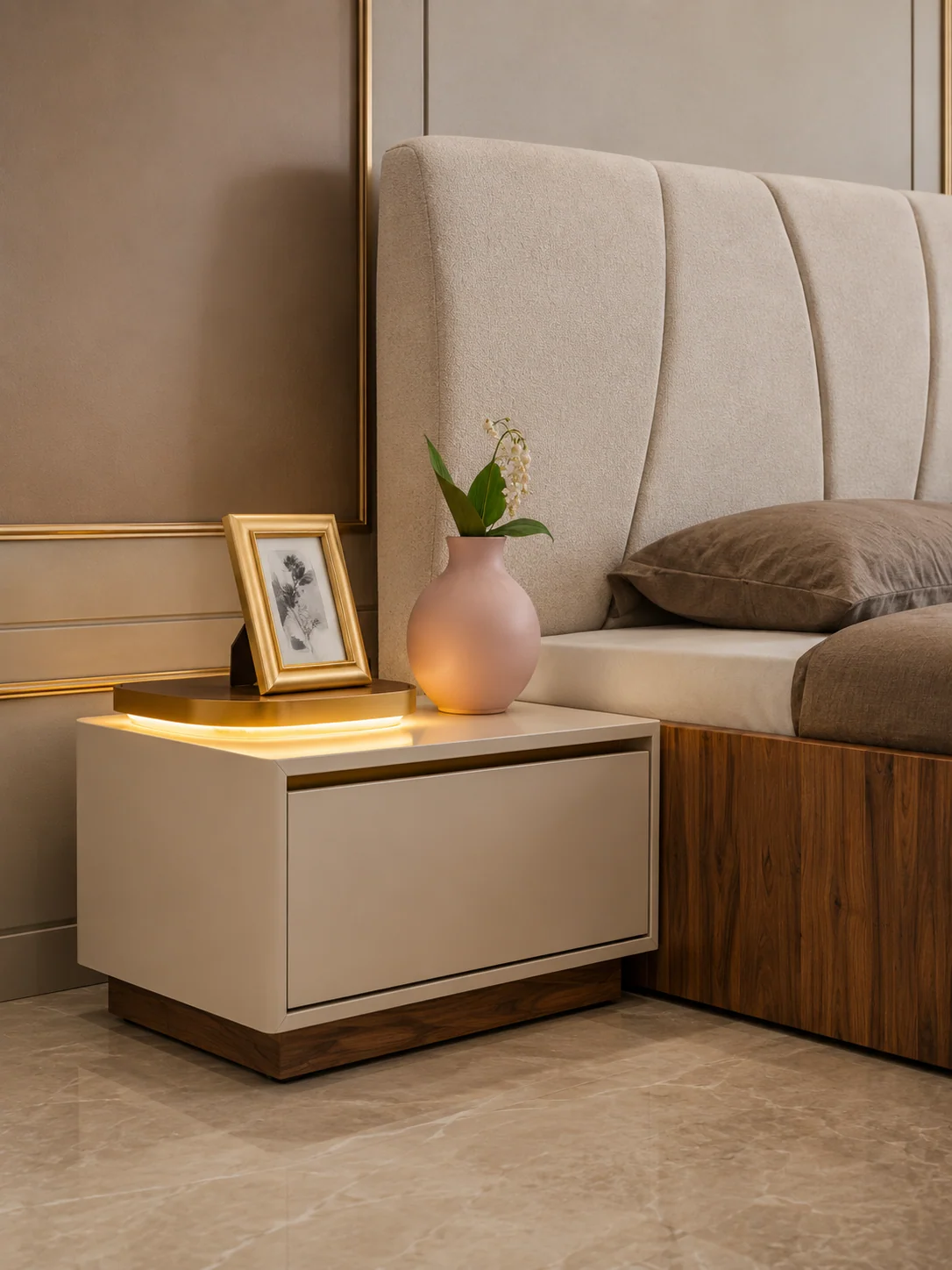 LAZIO modern nightstand beside an upholstered storage bed with warm wood and neutral finishes