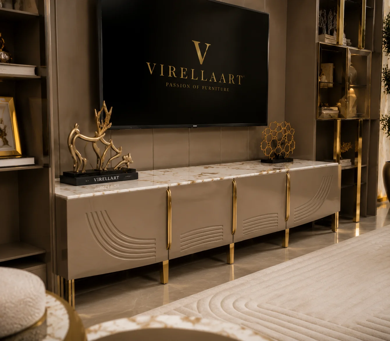 Close-up of the Moon taupe TV console with a pale marble-look top, curved embossed door lines, gold-tone handles and slim metallic legs