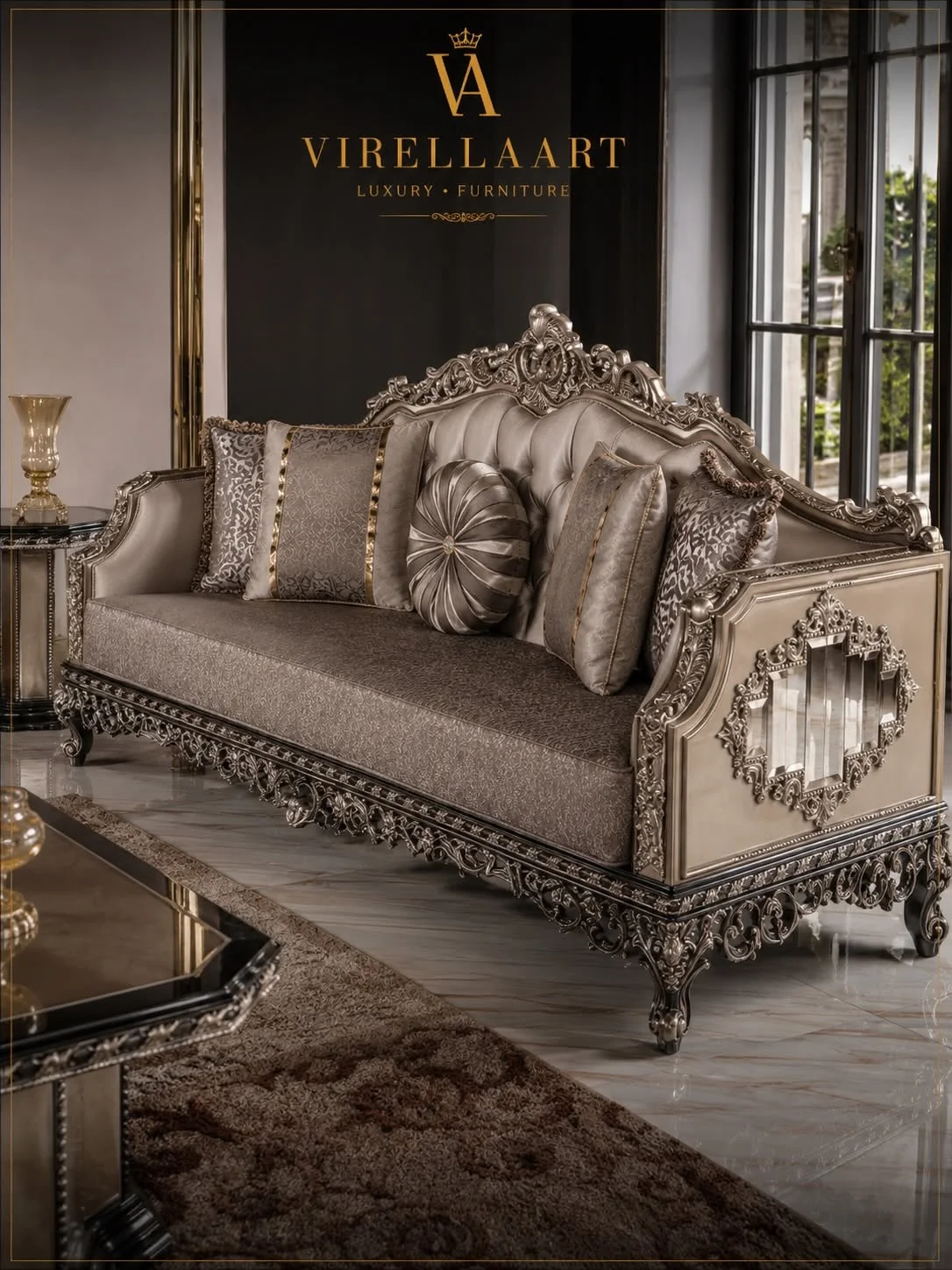 Zumrut taupe three-seat sofa with a tufted back, patterned cushions, mirrored side panels and elaborate black carved framing
